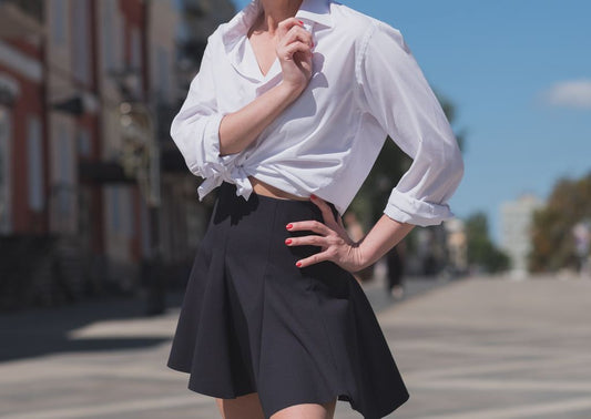 Black mini skirt with white shirt styled for summer