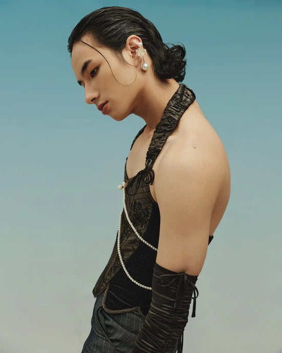 androgynous model in a top